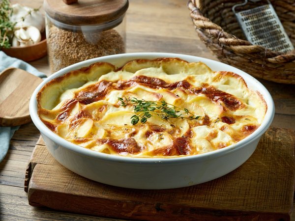 Quels sont les astuces pour un gratin de courgettes au parmesan et crème fraîche ?